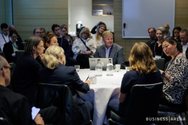 People in a round table discussion.